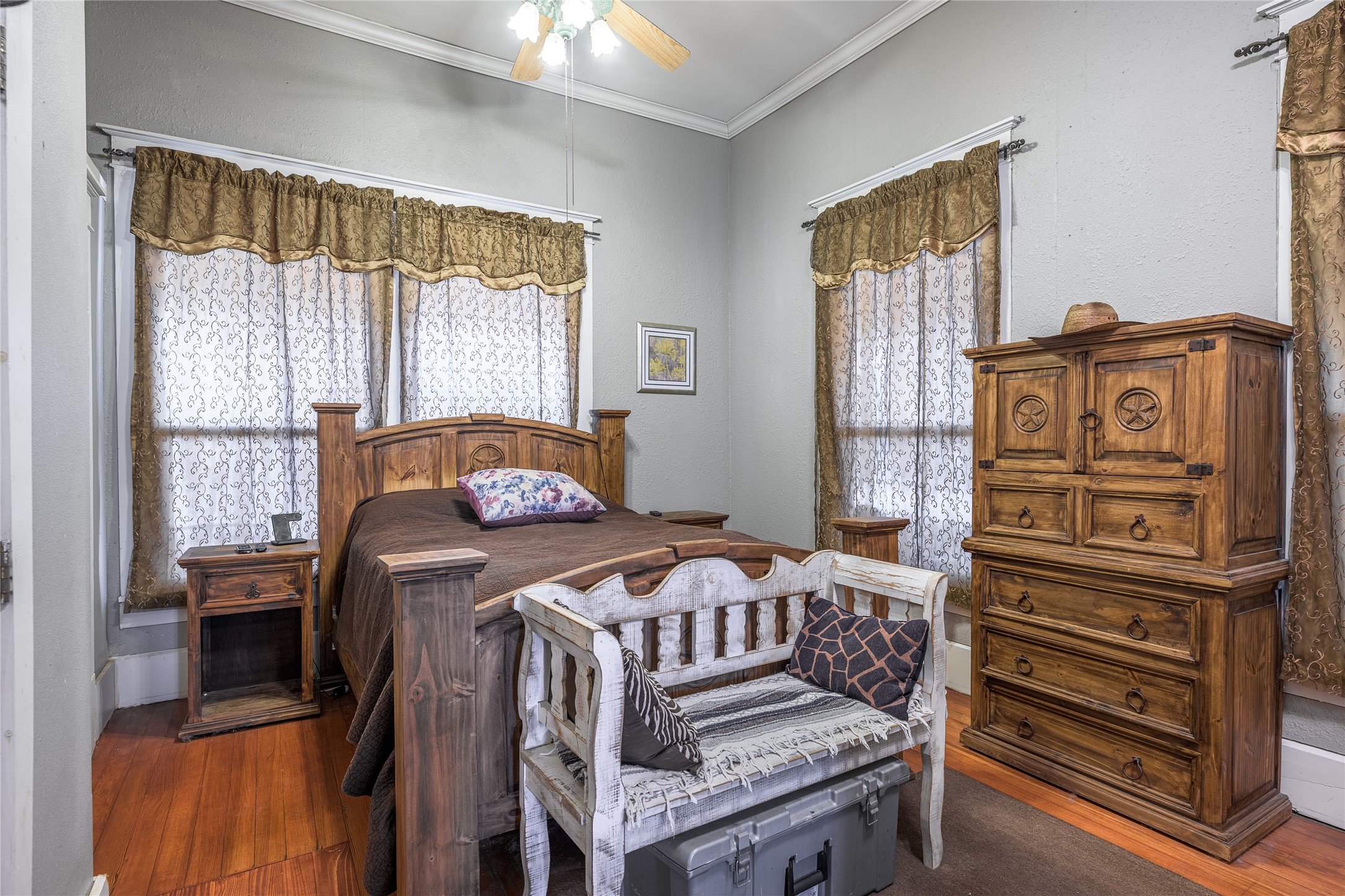 1000 North Park Street Brenham, TX 77833 - Photo 17 of 23 a bedroom with a bed next to a window