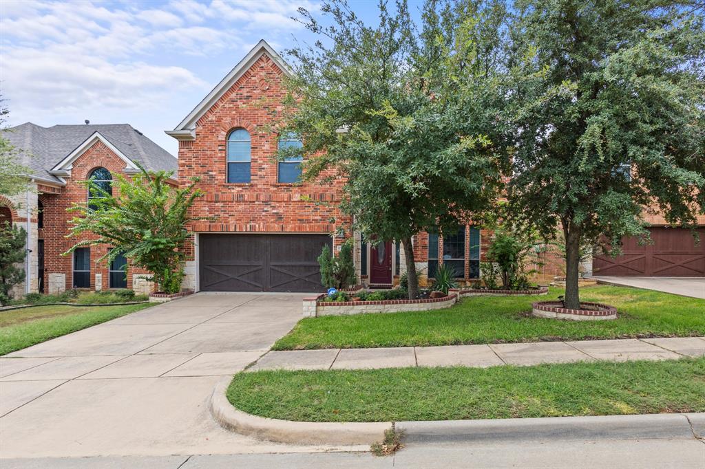 front view of house with a yard