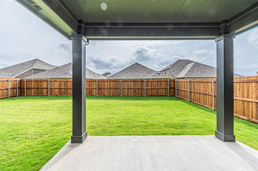 780 Moonlight Place Lavon, TX 75166 - Photo 29 of 35 Fenced backyard with a patio area