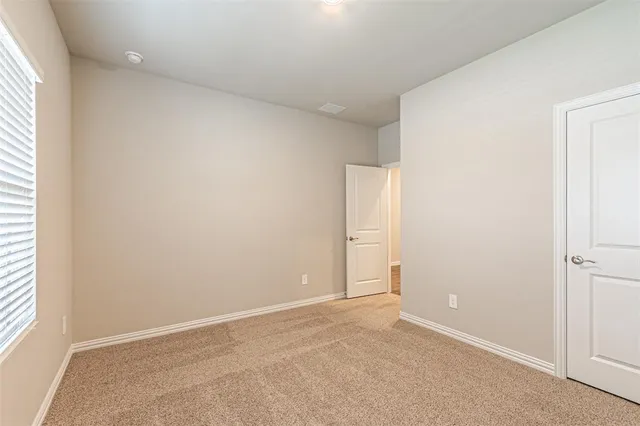 an empty room with an entryway