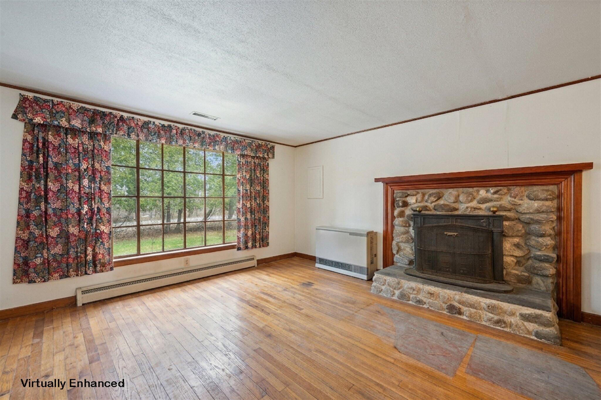 62 Bowden Point Road Prospect, ME 04981 - Photo 19 of 47 Living Room - Virtually enhanced