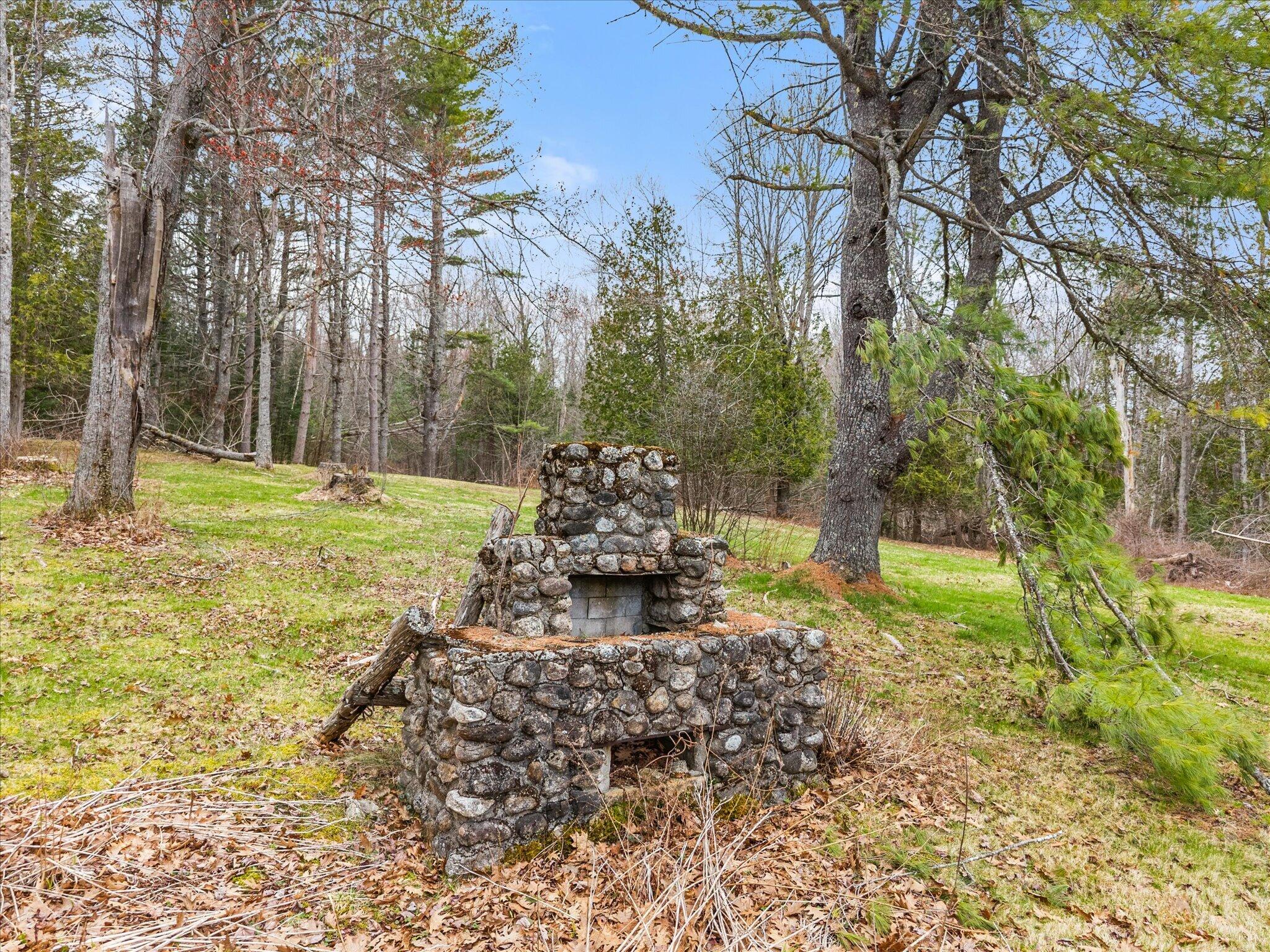 62 Bowden Point Road Prospect, ME 04981 - Photo 39 of 47 Stone Fireplace