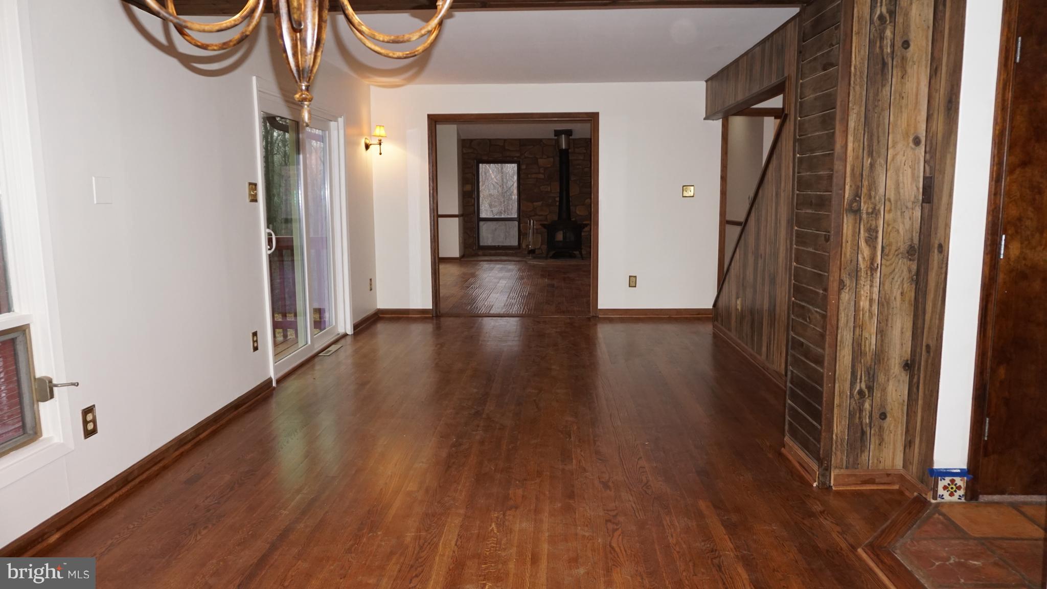 1270 Old Landing Road Accokeek, MD 20607 - Photo 14 of 48 a view of a hallway with wooden floor