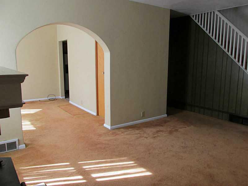317 Freeport Road Blawnox, PA 15238 - Photo 3 of 18 Living Room. Original archways. Wall-to-Wall carpet.