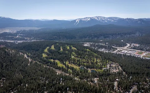 a view of a city with a mountain