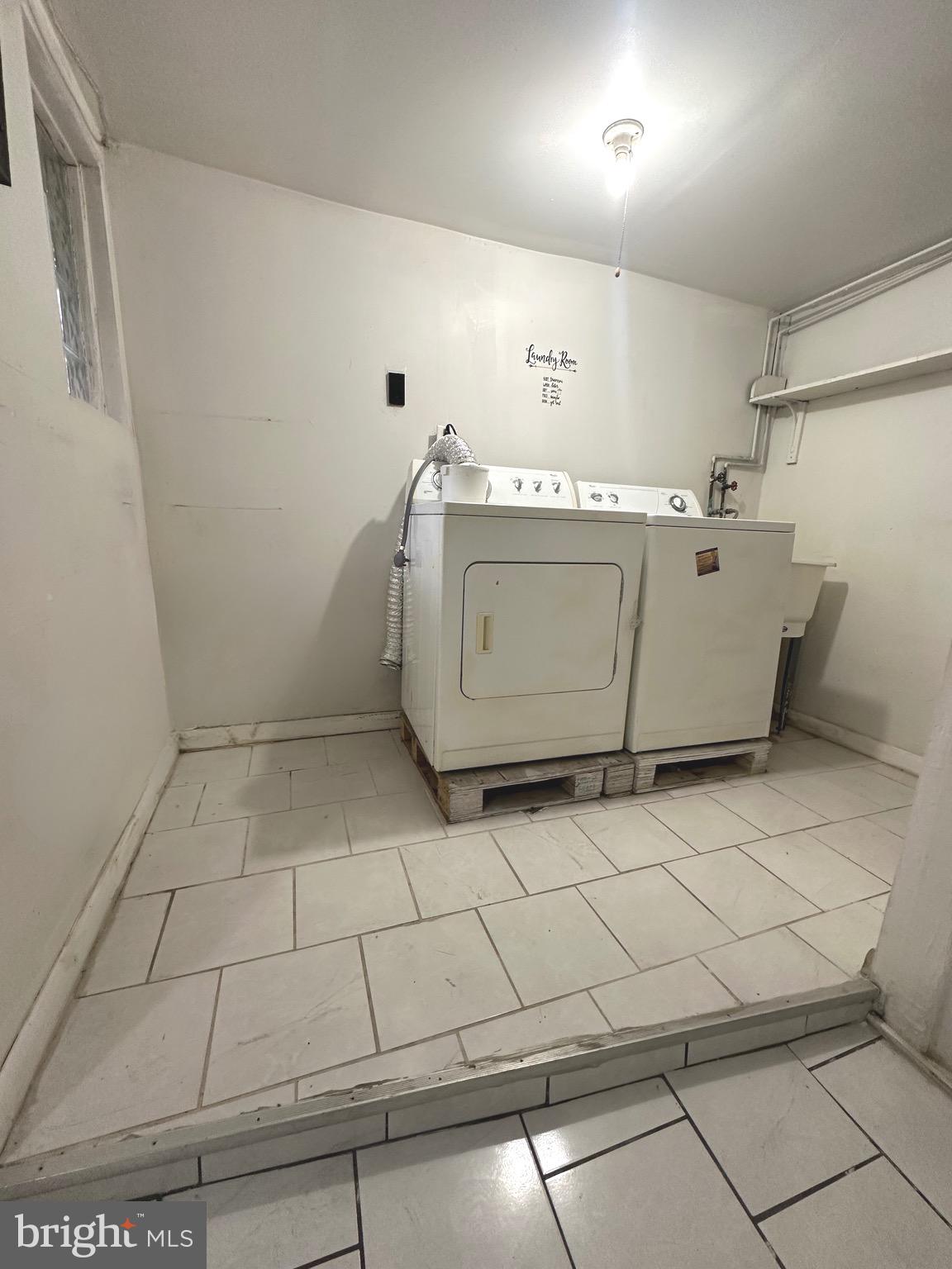 5332 Master Street Philadelphia, PA 19131 - Photo 14 of 17 a utility room with cabinets