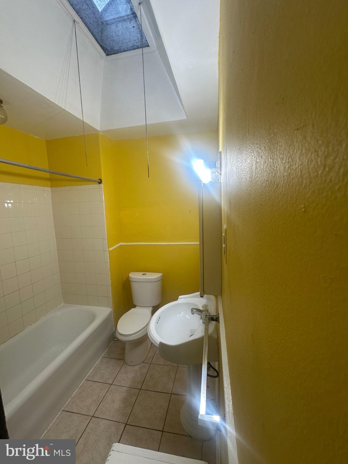 5332 Master Street Philadelphia, PA 19131 - Photo 8 of 17 a bathroom with a toilet and a shower