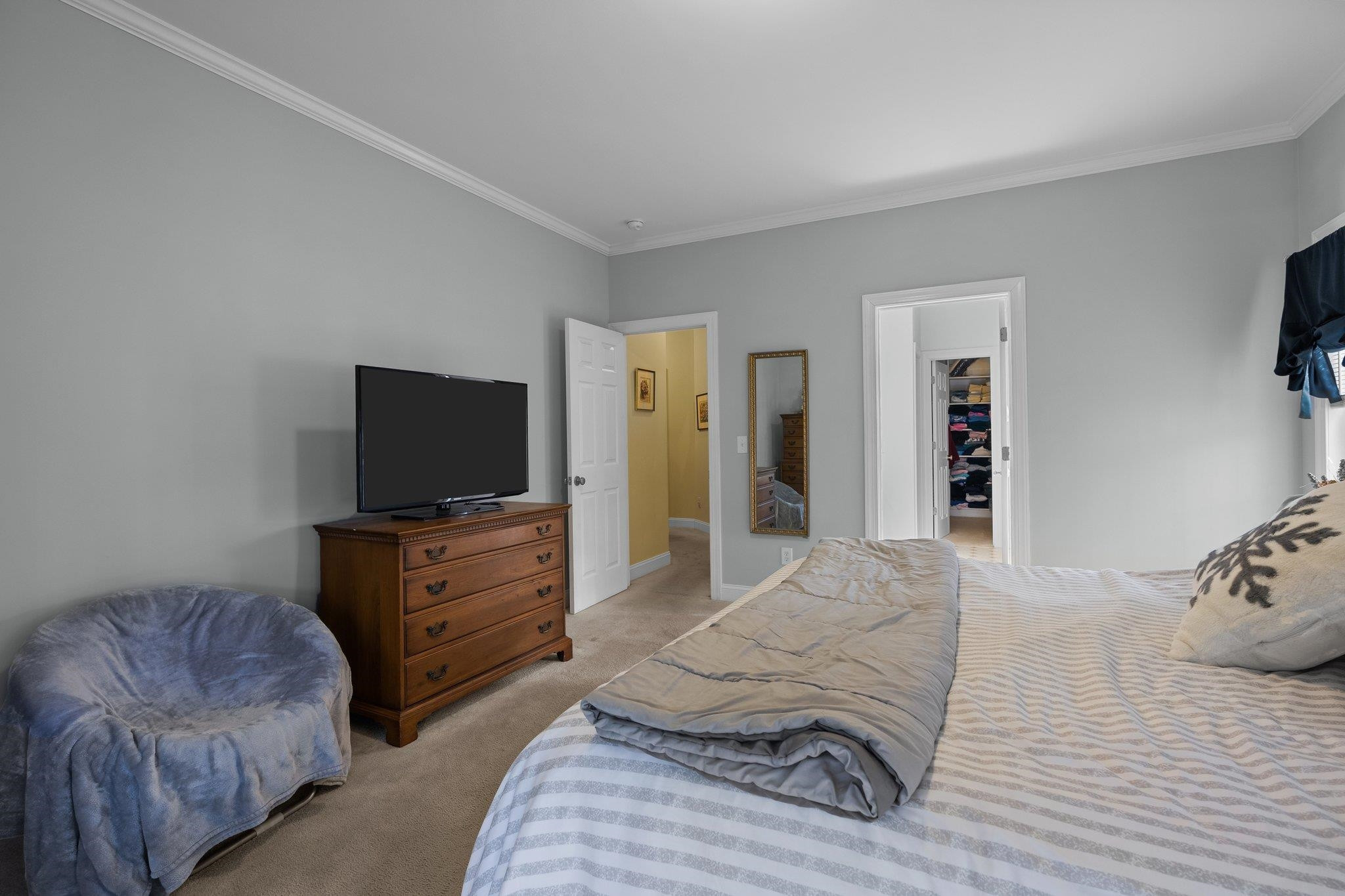 104 Shadow Lane Oxford, NC 27565 - Photo 17 of 38 a bedroom with a bed and a television