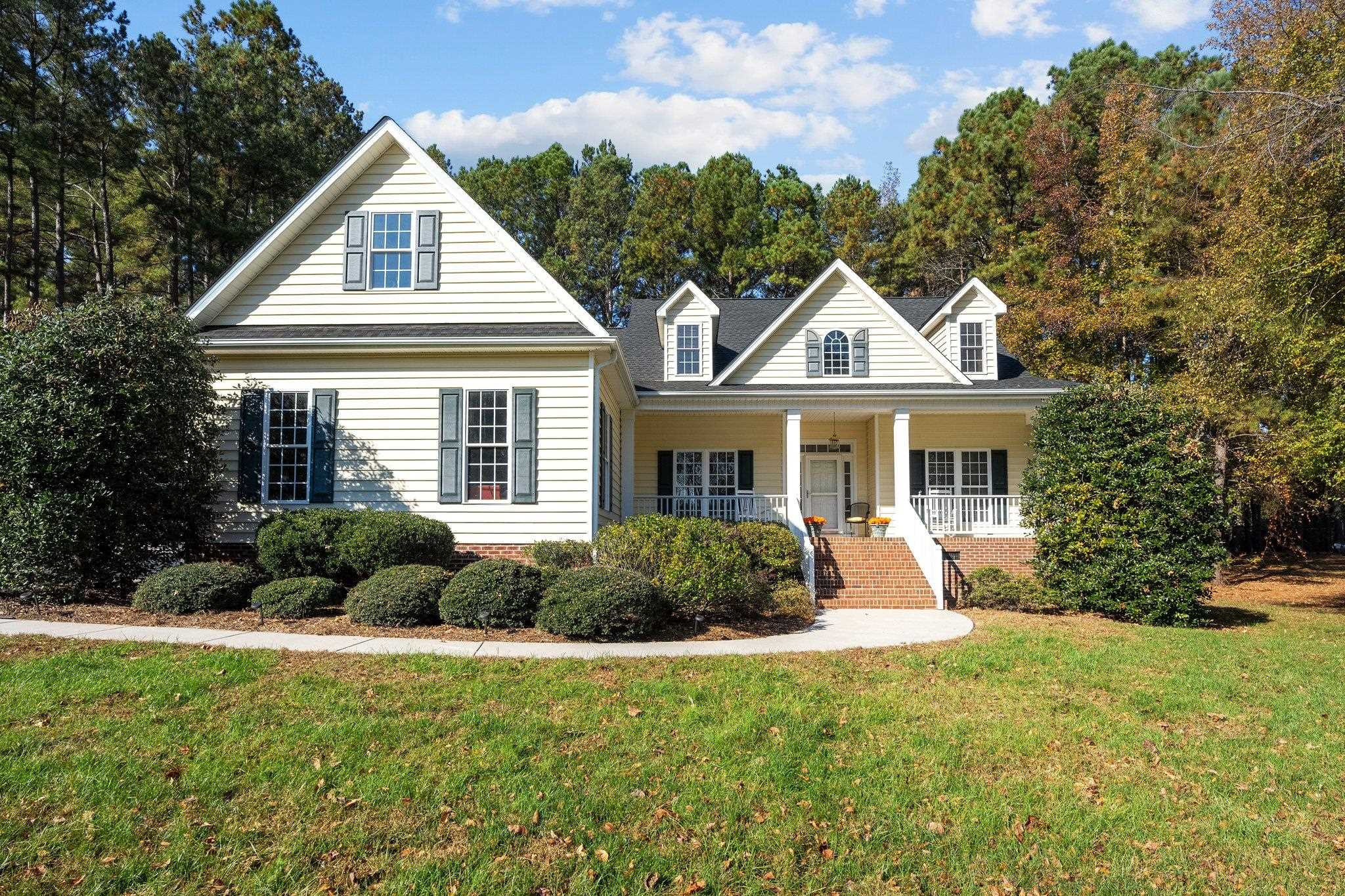 104 Shadow Lane Oxford, NC 27565 - Photo 2 of 38 a front view of house with yard and green space