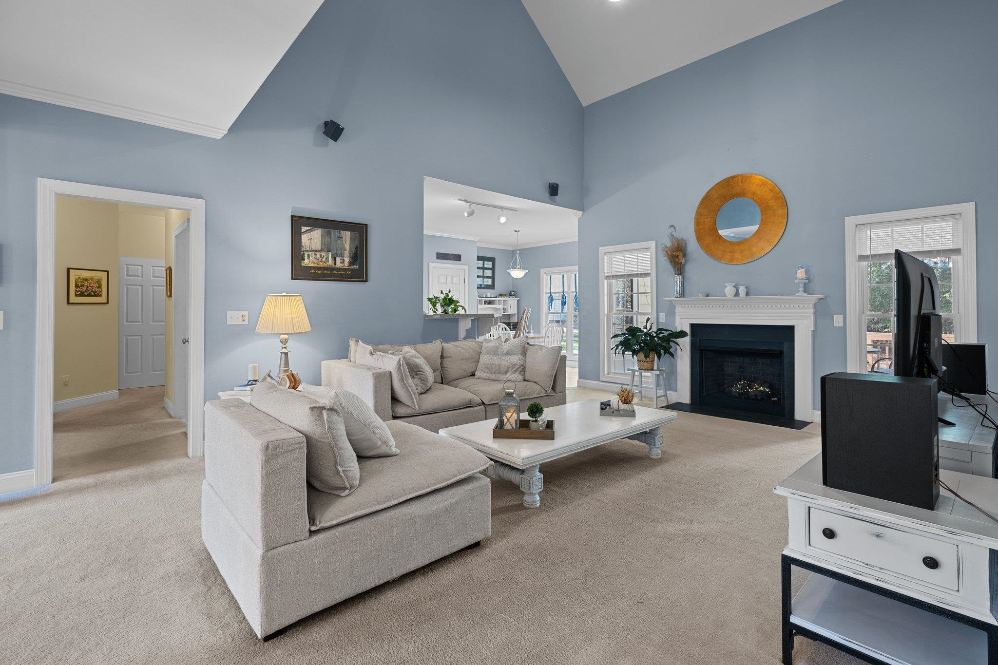 104 Shadow Lane Oxford, NC 27565 - Photo 26 of 38 a living room with furniture a fireplace and a window