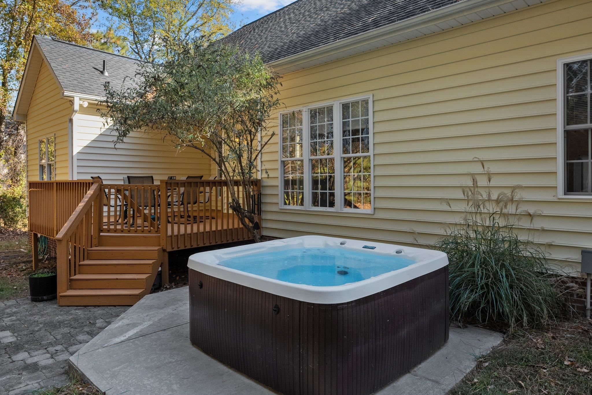 104 Shadow Lane Oxford, NC 27565 - Photo 35 of 38 a view of a balcony with chair and tables