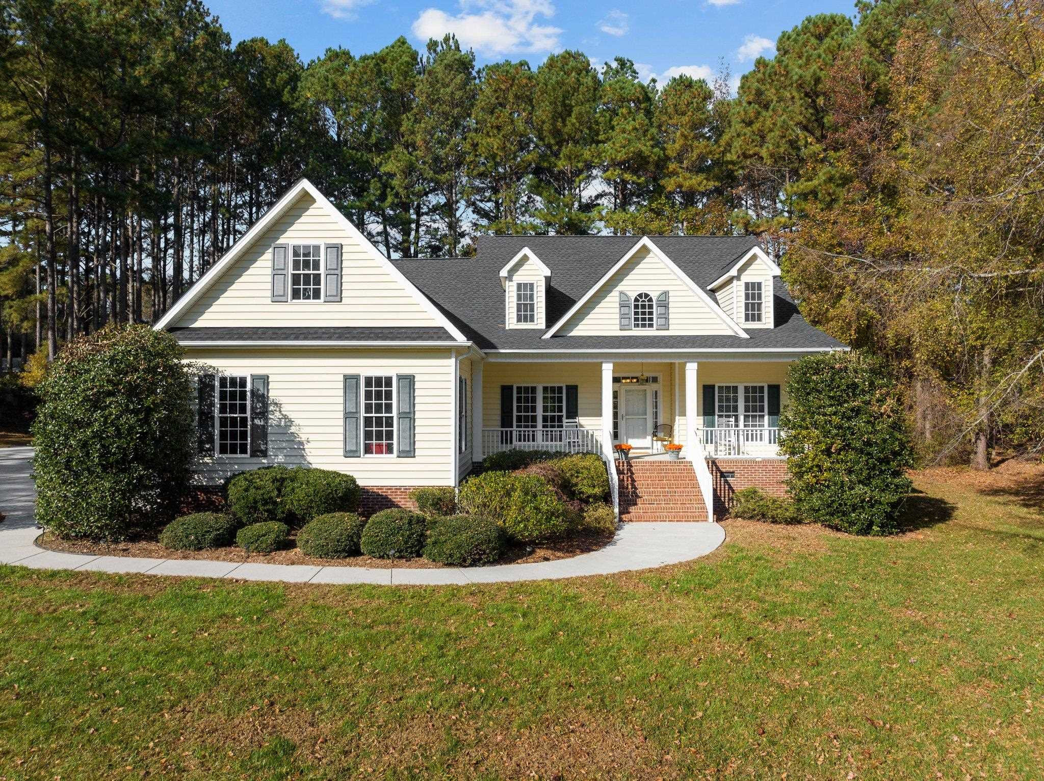 104 Shadow Lane Oxford, NC 27565 - Photo 38 of 38 a front view of a house with a yard
