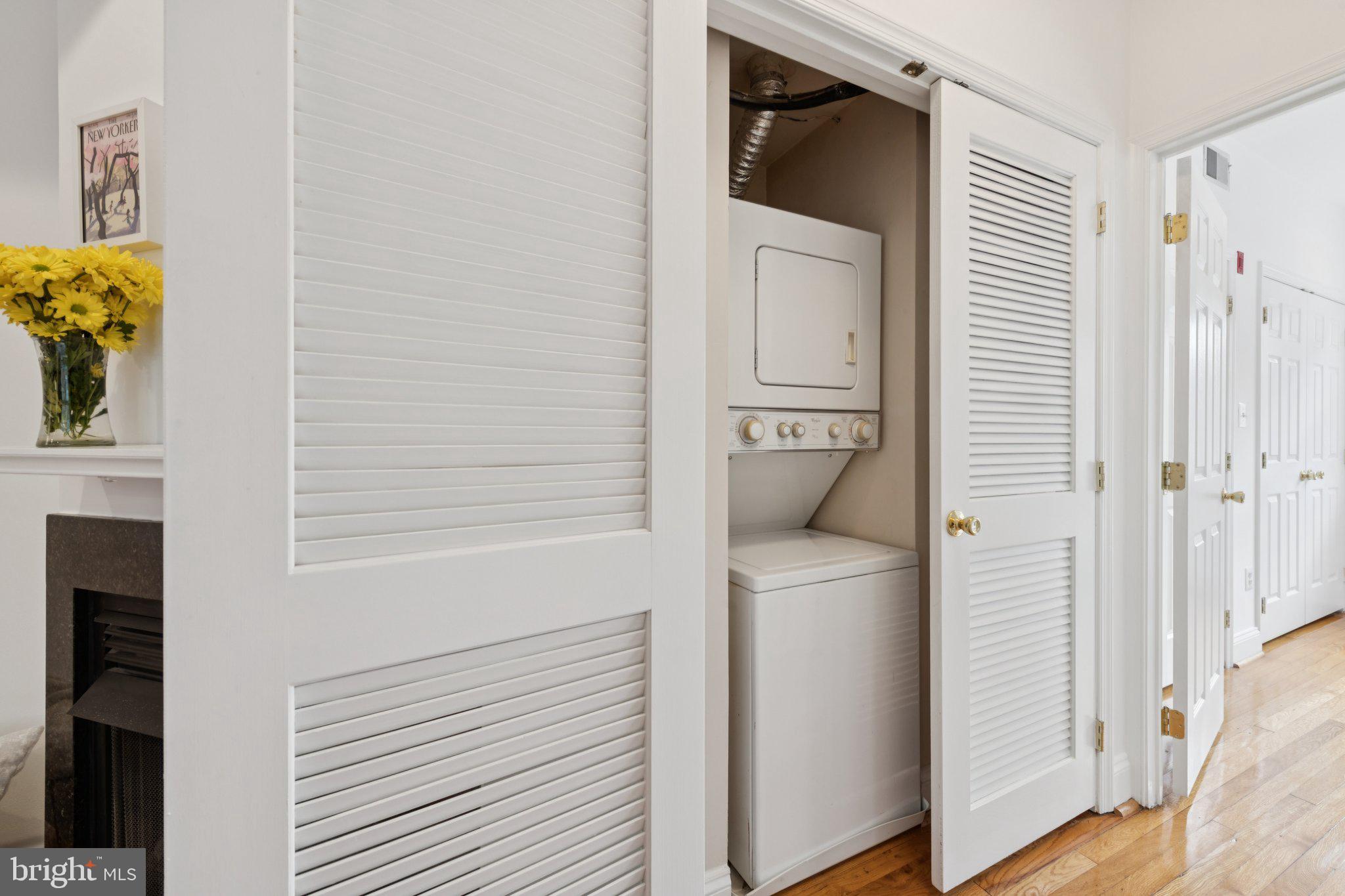 1438 Columbia Road Northwest, Unit 305 Washington, DC 20009 - Photo 14 of 22 a utility room with a washer and dryer