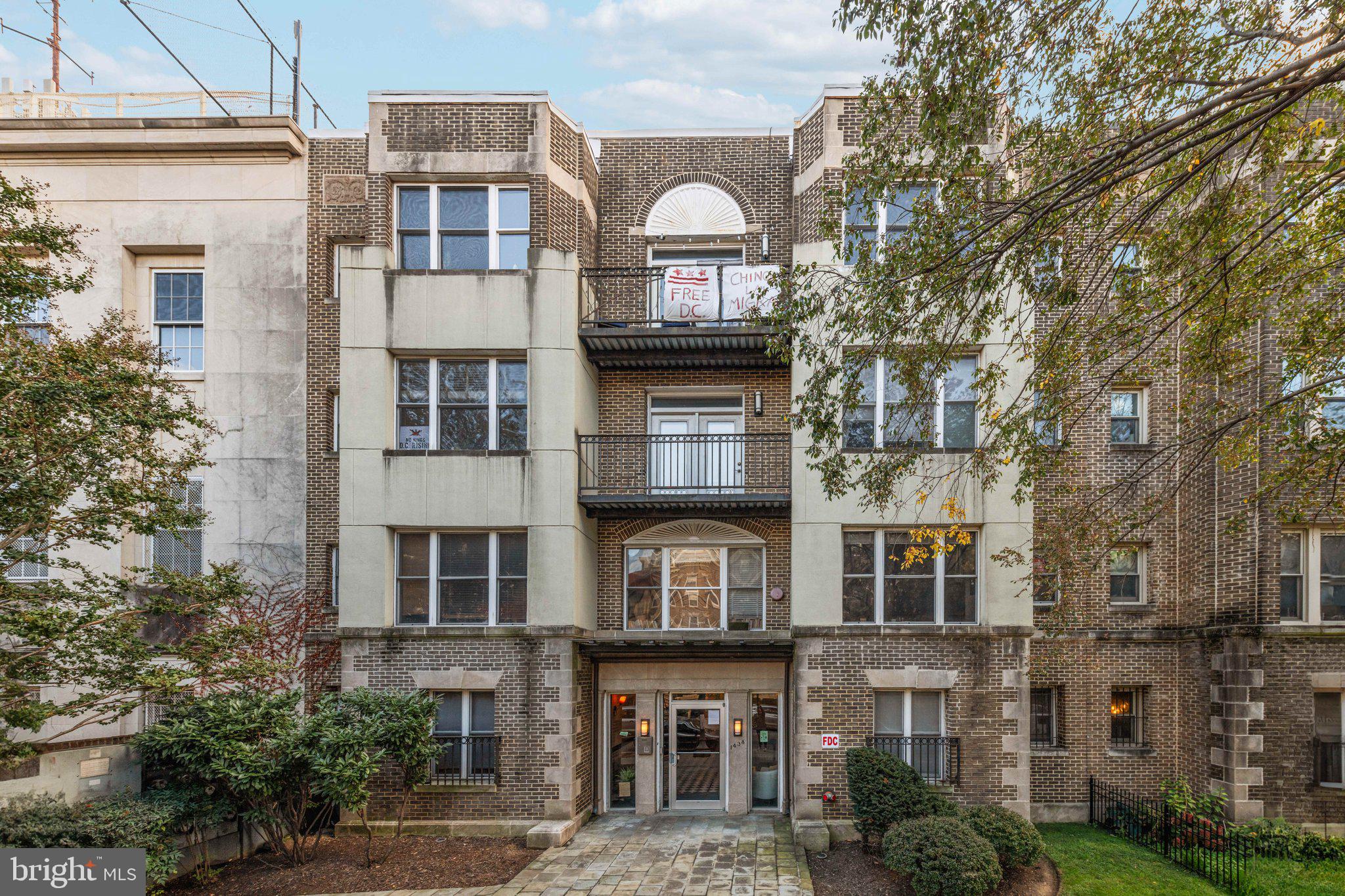 1438 Columbia Road Northwest, Unit 305 Washington, DC 20009 - Photo 5 of 22 a front view of a building with garden