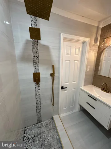 a view of hallway with chandelier