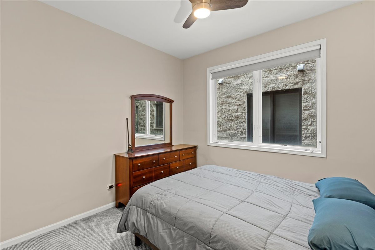 2025 West Rice Street, Unit 2 Chicago, IL 60622 - Photo 11 of 17 a bedroom with a bed and a window