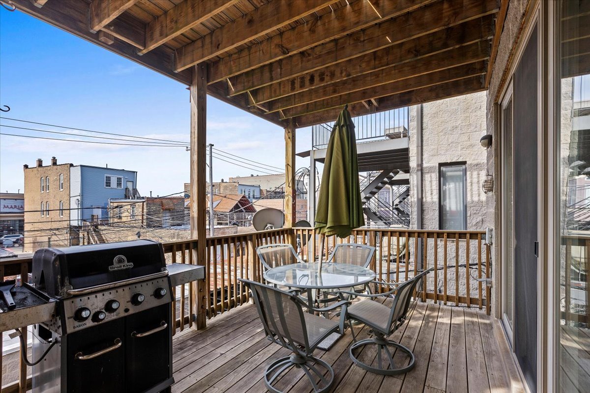 2025 West Rice Street, Unit 2 Chicago, IL 60622 - Photo 15 of 17 a view of a chairs and table in the balcony