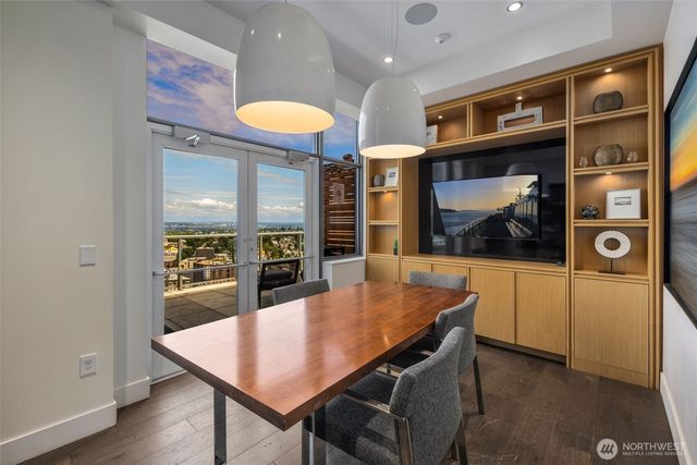 a kitchen with stainless steel appliances a refrigerator and a stove