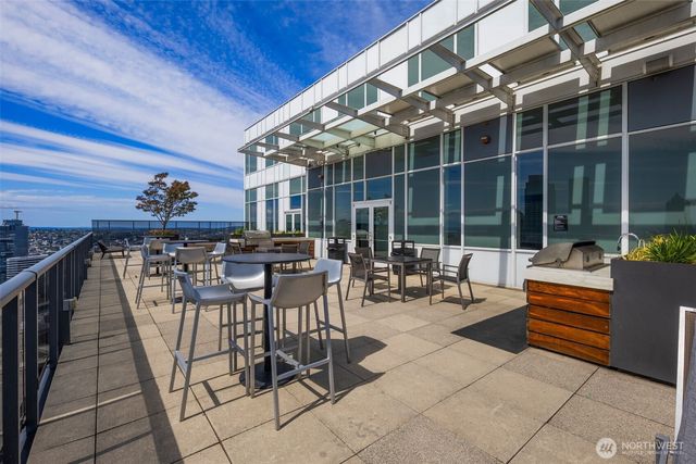 a view of a chairs and tables in the patio