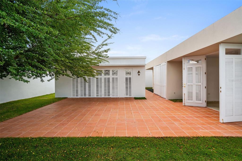 7 Barcelona Street Humacao, PR 00791 - Photo 14 of 16 a view of backyard with green space