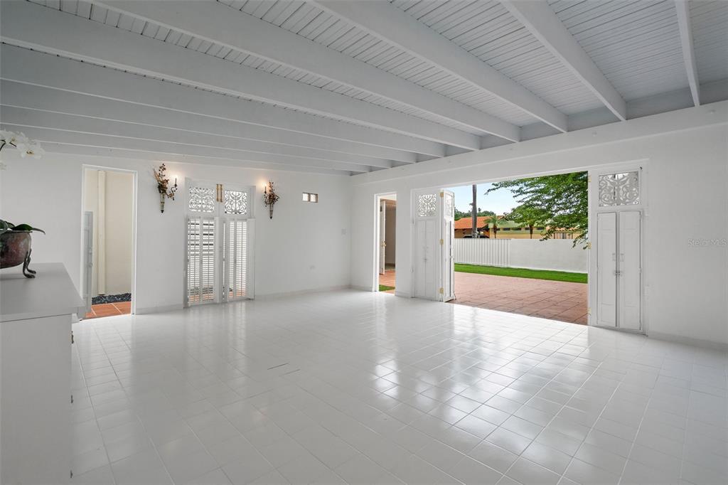 7 Barcelona Street Humacao, PR 00791 - Photo 15 of 16 a view of a livingroom with wooden floor