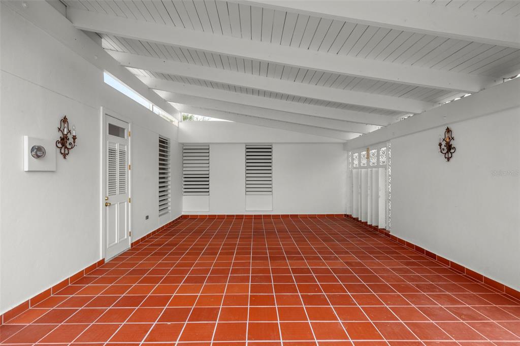 7 Barcelona Street Humacao, PR 00791 - Photo 2 of 16 a view of an empty room with a window