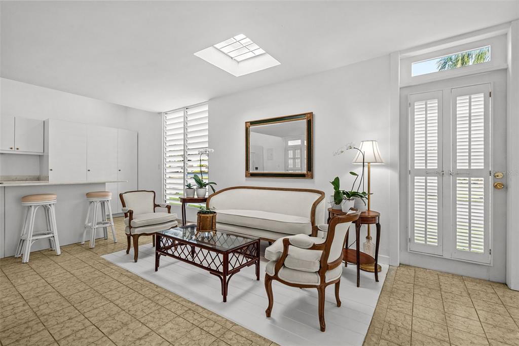 7 Barcelona Street Humacao, PR 00791 - Photo 6 of 16 a living room with furniture and a window