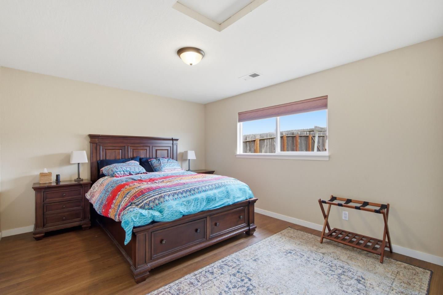1263 Reservoir Road Pescadero, CA 94060 - Photo 55 of 66 a bedroom with a bed and a window