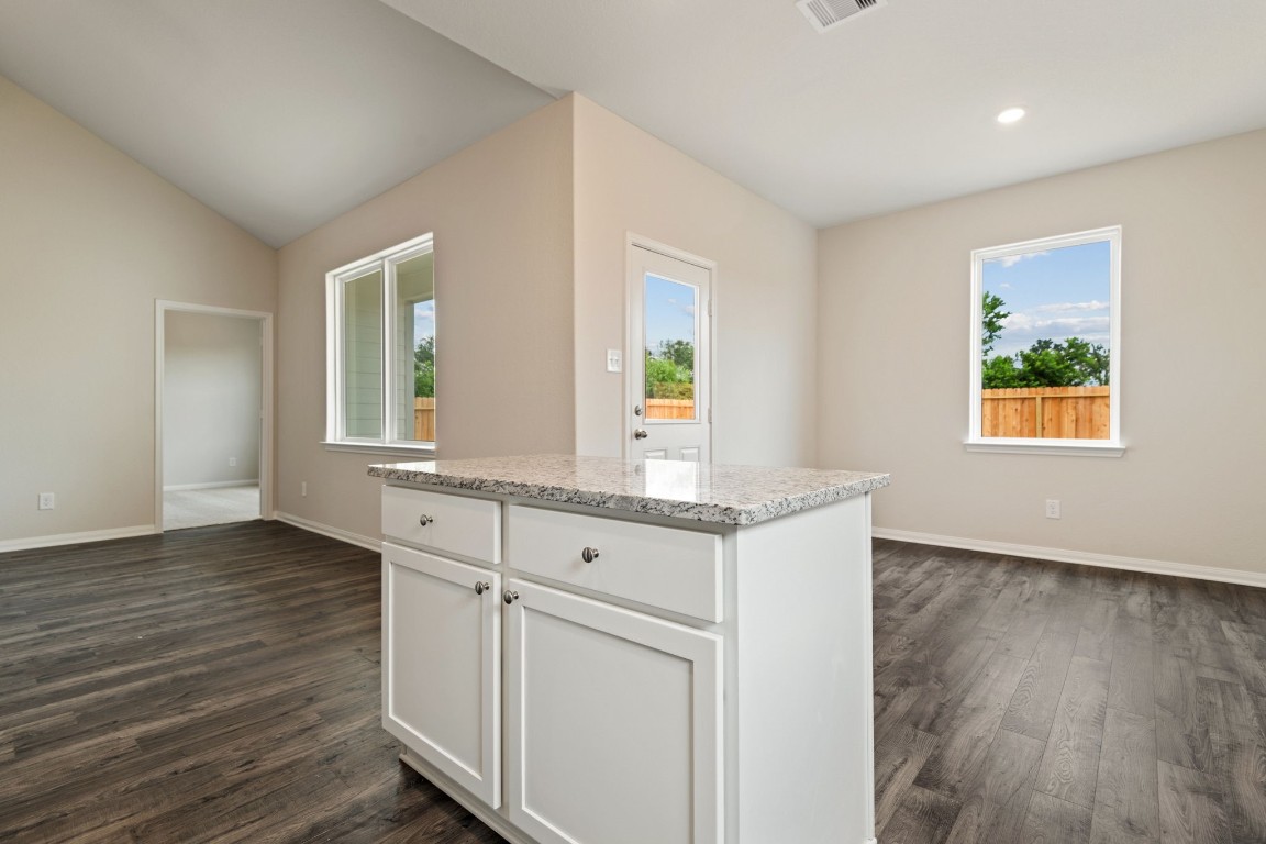 345 Fastboy Lane Waller, TX 77484 - Photo 10 of 12 a view of a kitchen cabinets and wooden floor