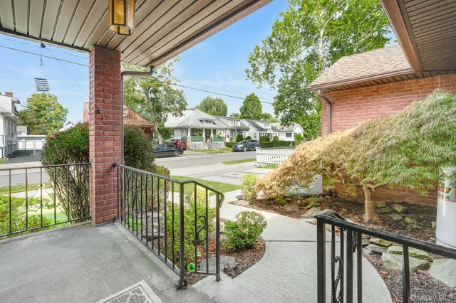 a view of a porch and garden