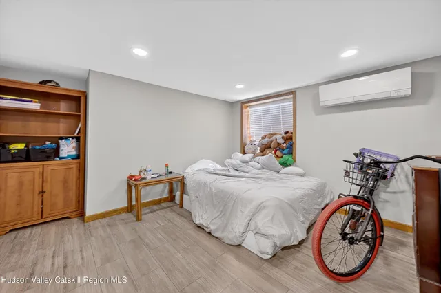 a bedroom with a bed and a closet