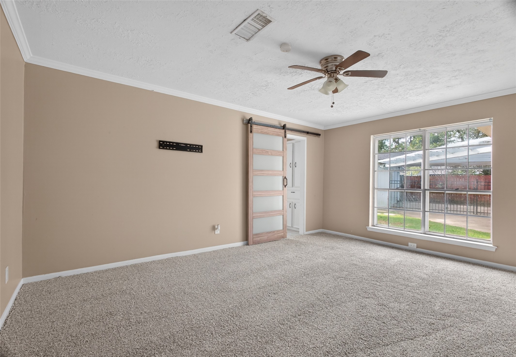 27210 Jimmy Lane Conroe, TX 77385 - Photo 18 of 43 a view of an empty room with a window
