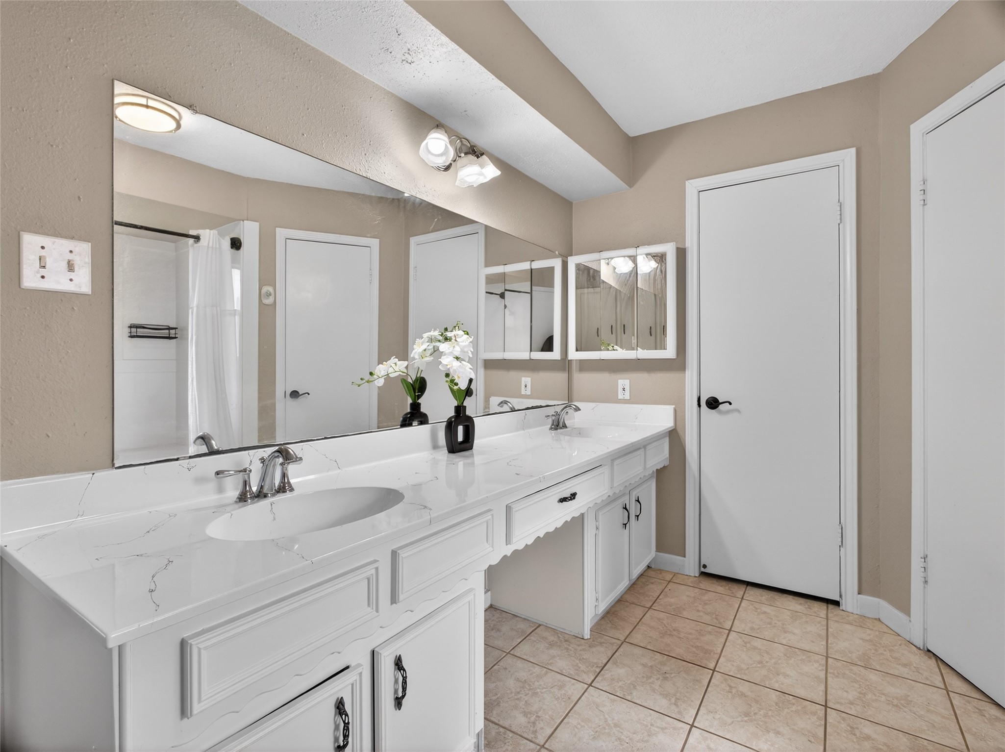 27210 Jimmy Lane Conroe, TX 77385 - Photo 20 of 43 a view with granite countertop a sink and dishwasher with a large mirror next to a window