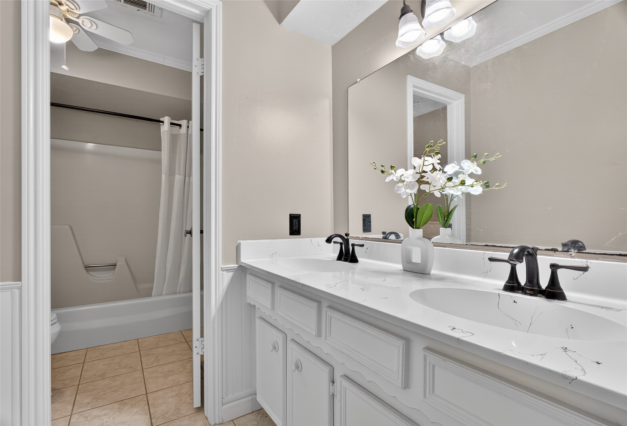 27210 Jimmy Lane Conroe, TX 77385 - Photo 27 of 43 a bathroom with a sink a vanity and a mirror