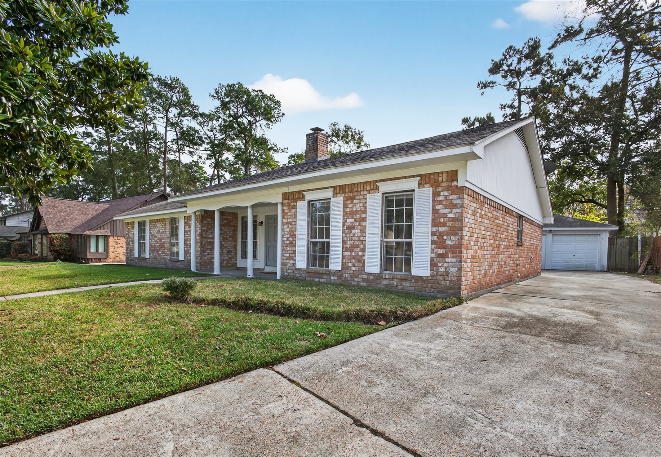 27210 Jimmy Lane Conroe, TX 77385 - Photo 29 of 43 a view of a yard in front of a house with large tree