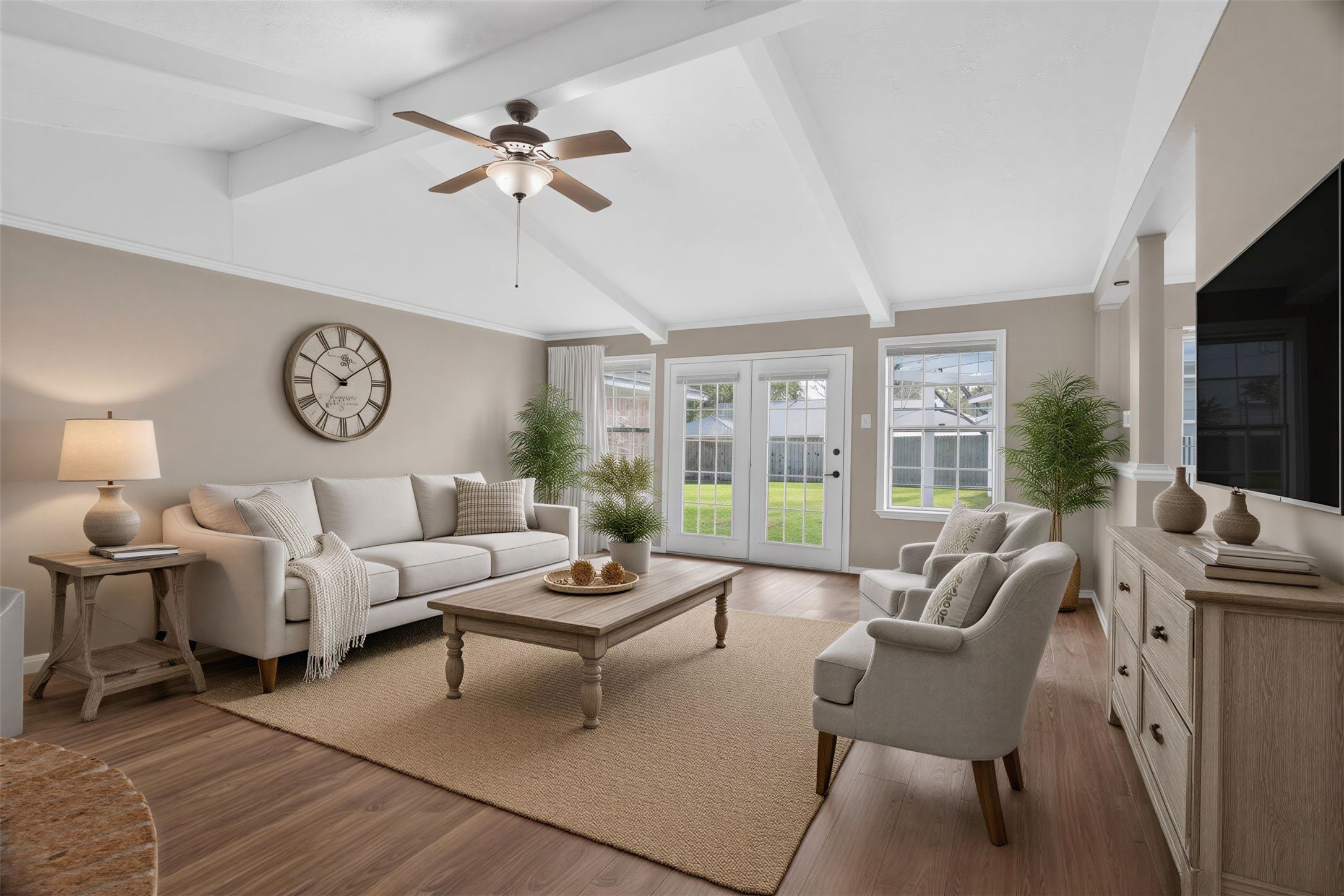 27210 Jimmy Lane Conroe, TX 77385 - Photo 10 of 43 a living room with furniture a fireplace and a large window