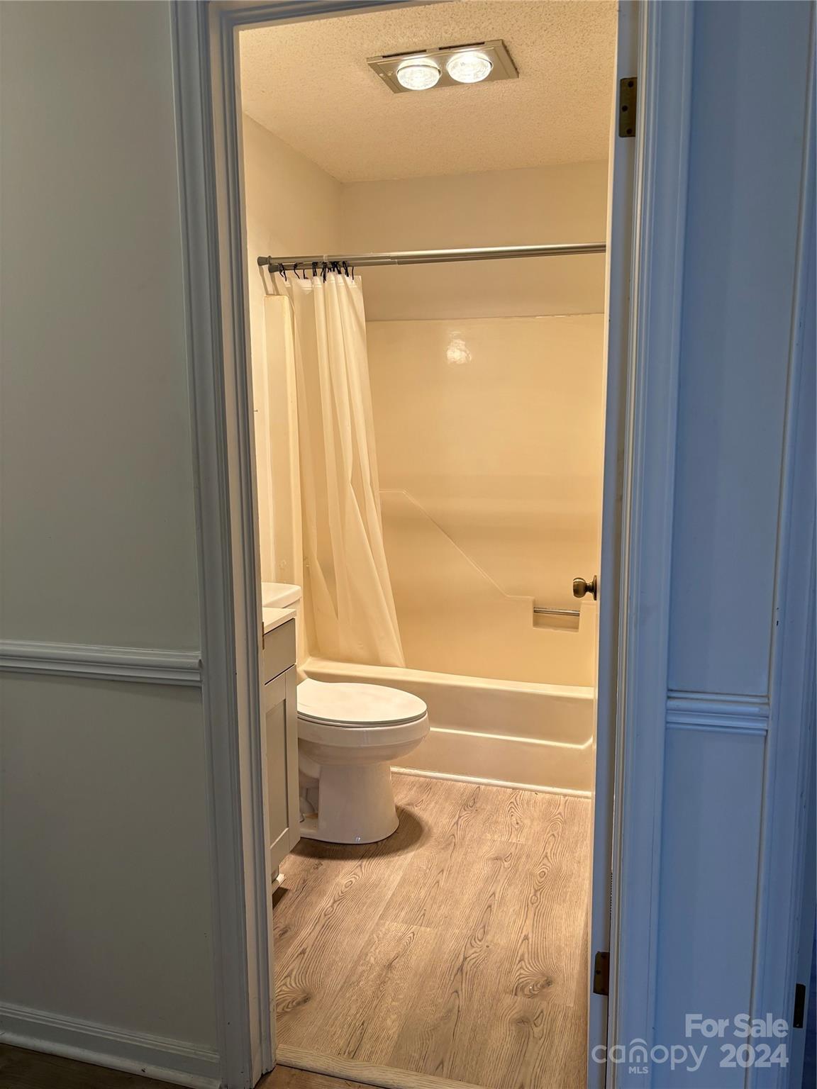 2145 East Holly Grove Road Lexington, NC 27292 - Photo 14 of 19 a bathroom with a toilet and a shower