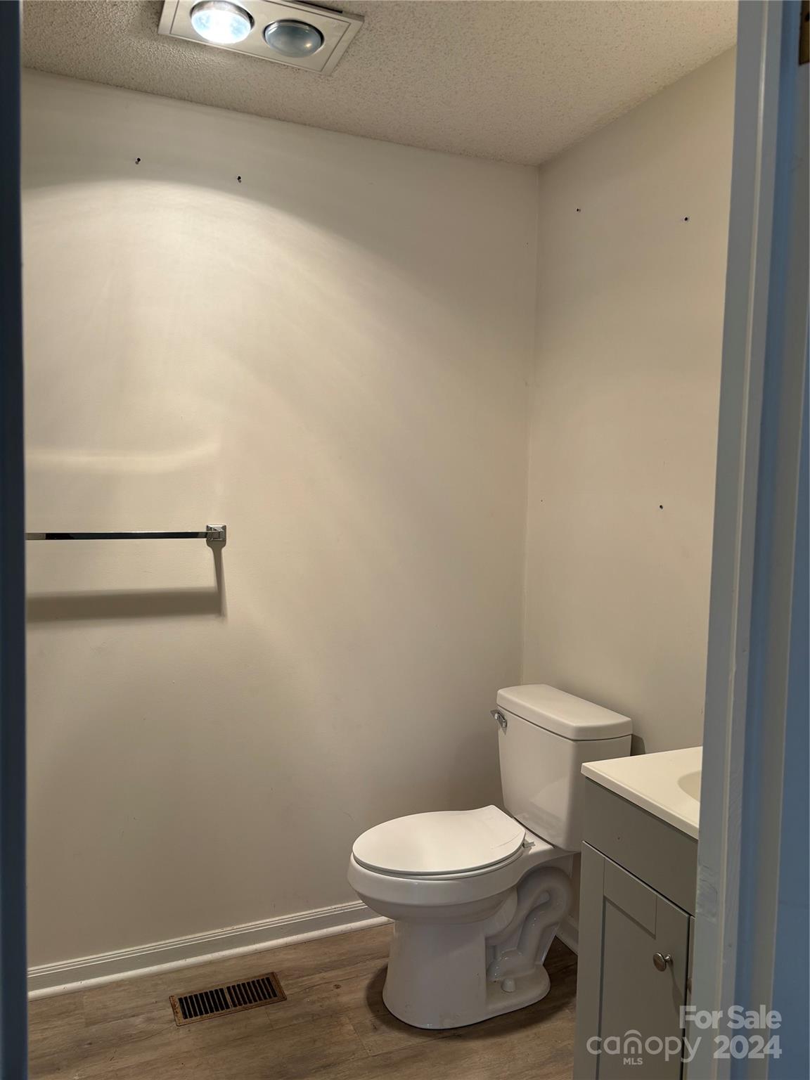 2145 East Holly Grove Road Lexington, NC 27292 - Photo 19 of 19 a white toilet sitting next to a shower