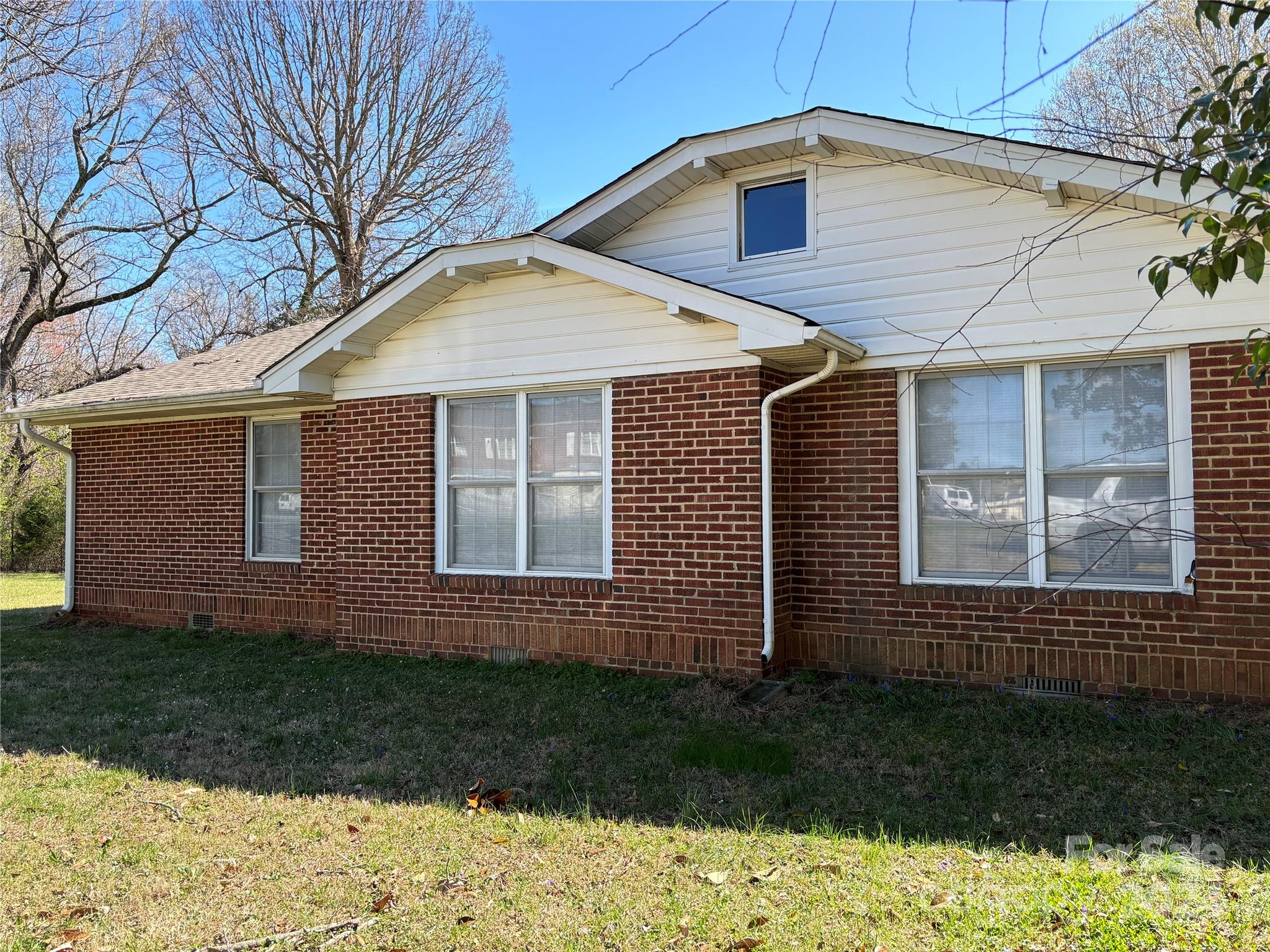 2145 East Holly Grove Road Lexington, NC 27292 - Photo 2 of 19 a front view of a house with a yard