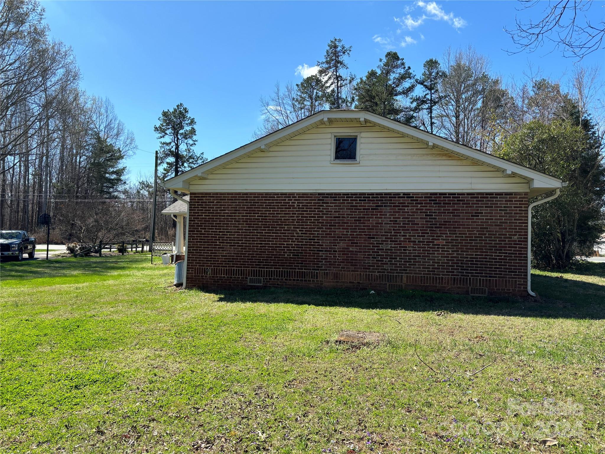 2145 East Holly Grove Road Lexington, NC 27292 - Photo 3 of 19 a front view of house with yard and trees