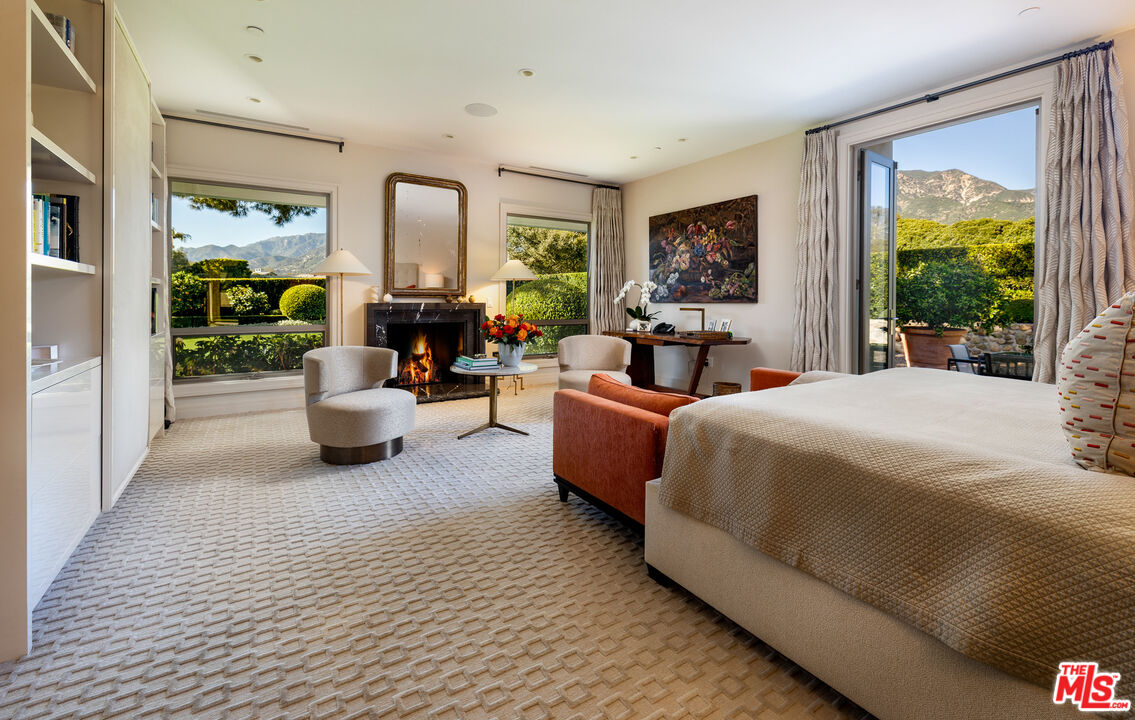 2076 China Flat Road Santa Barbara, CA 93108 - Photo 15 of 27 a bedroom with a balcony a bed and a couch