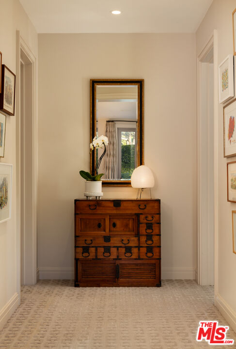 2076 China Flat Road Santa Barbara, CA 93108 - Photo 17 of 27 a large bed sitting in a bedroom next to a cabinet