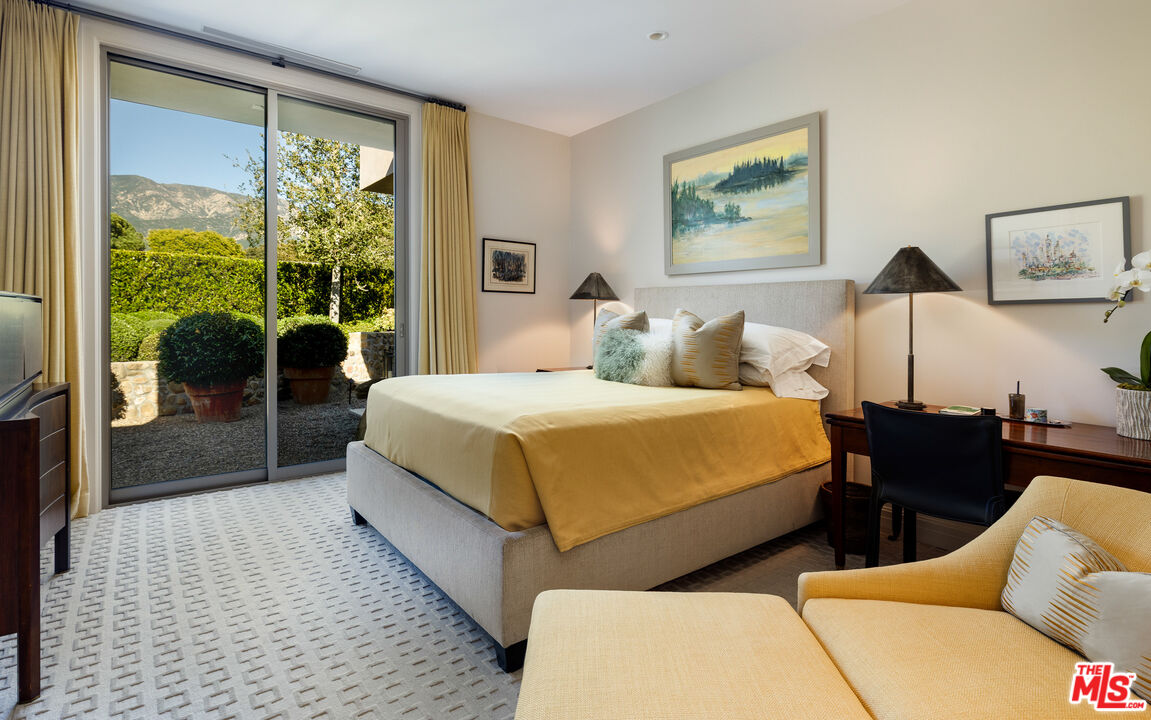 2076 China Flat Road Santa Barbara, CA 93108 - Photo 19 of 27 a bedroom with furniture and a large window