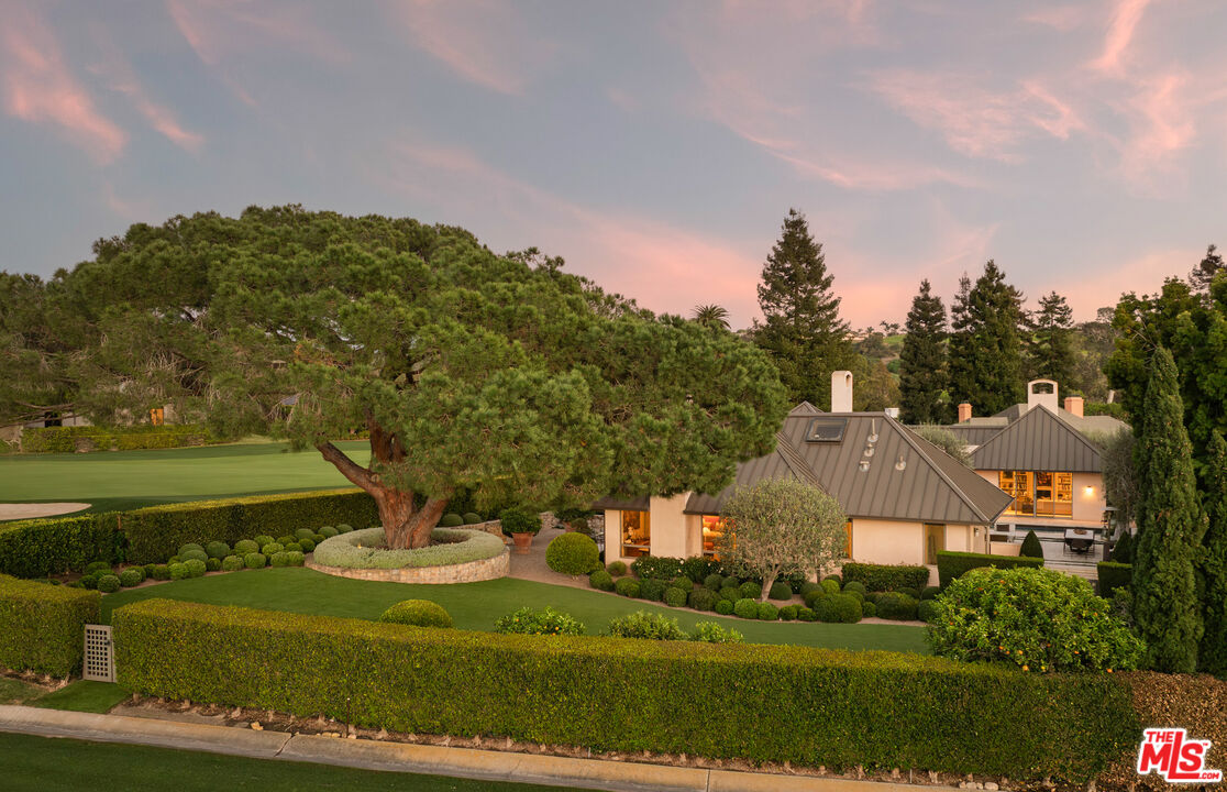 2076 China Flat Road Santa Barbara, CA 93108 - Photo 2 of 27 a front view of a house with a garden