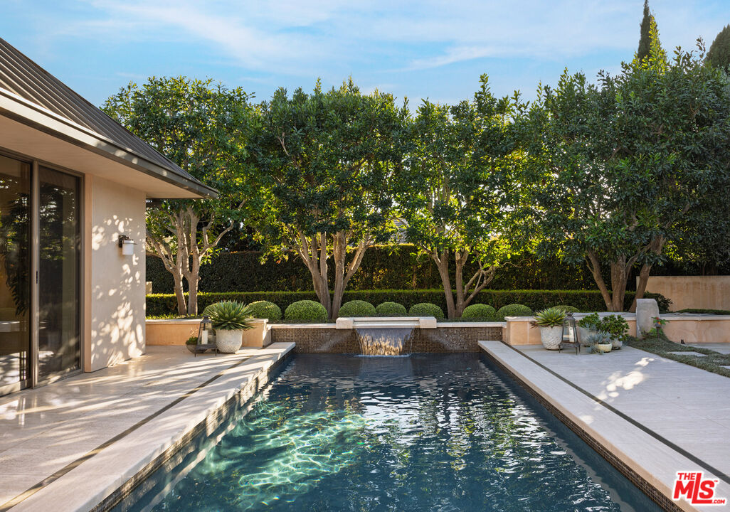 2076 China Flat Road Santa Barbara, CA 93108 - Photo 5 of 27 a view of a patio with chairs and potted plants