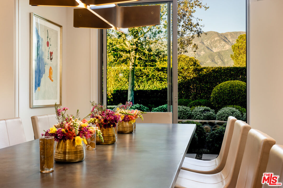 2076 China Flat Road Santa Barbara, CA 93108 - Photo 9 of 27 a dining room with furniture and wooden floor