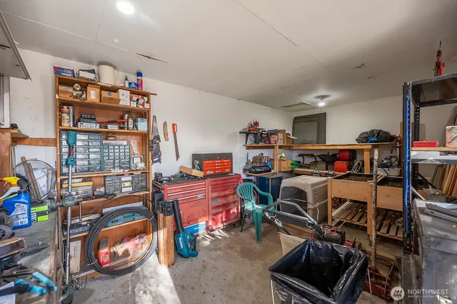 a room with furniture and a book shelf