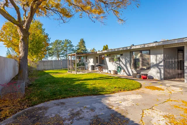 a view of swimming pool with a yard