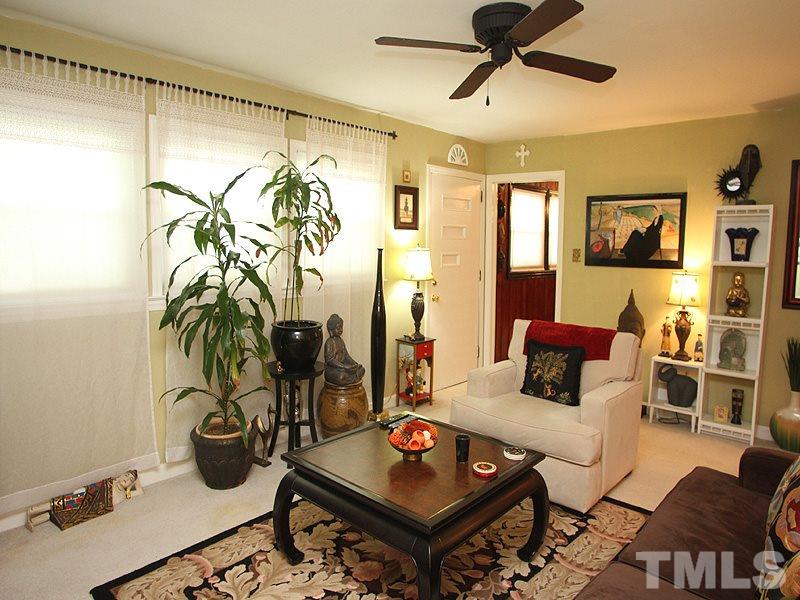 3101 Brentwood Road Raleigh, NC 27604 - Photo 3 of 17 a living room with furniture and wooden floor