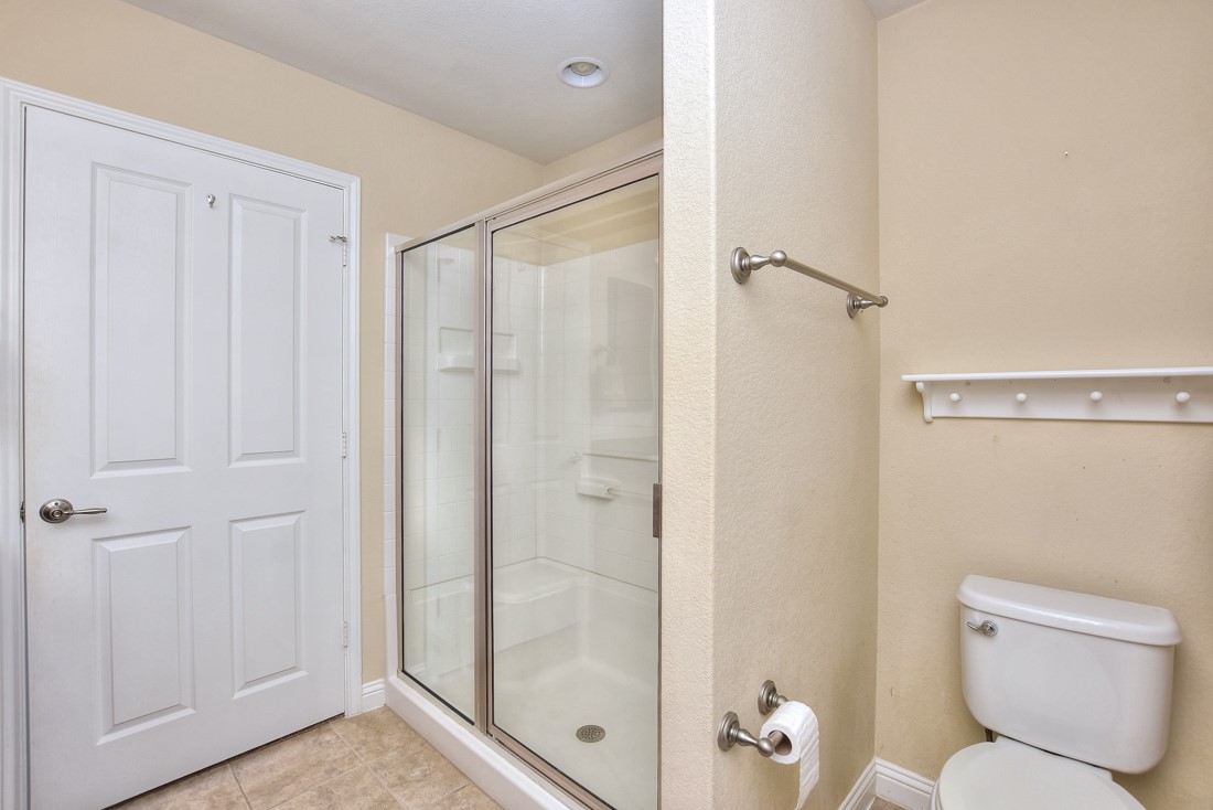 106 Kickapoo Creek Lane Georgetown, TX 78633 - Photo 23 of 33 a bathroom with a shower a toilet and a shower